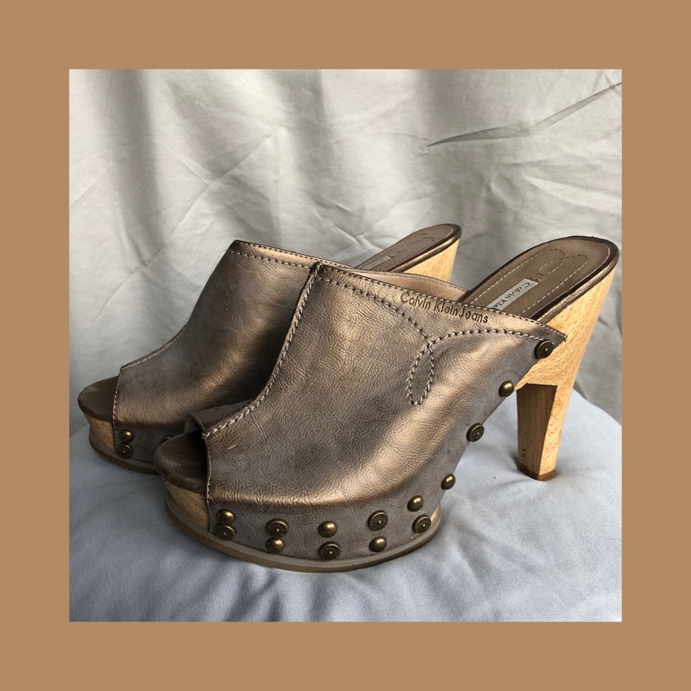 Calvin Klein metallic platform clogs with studs